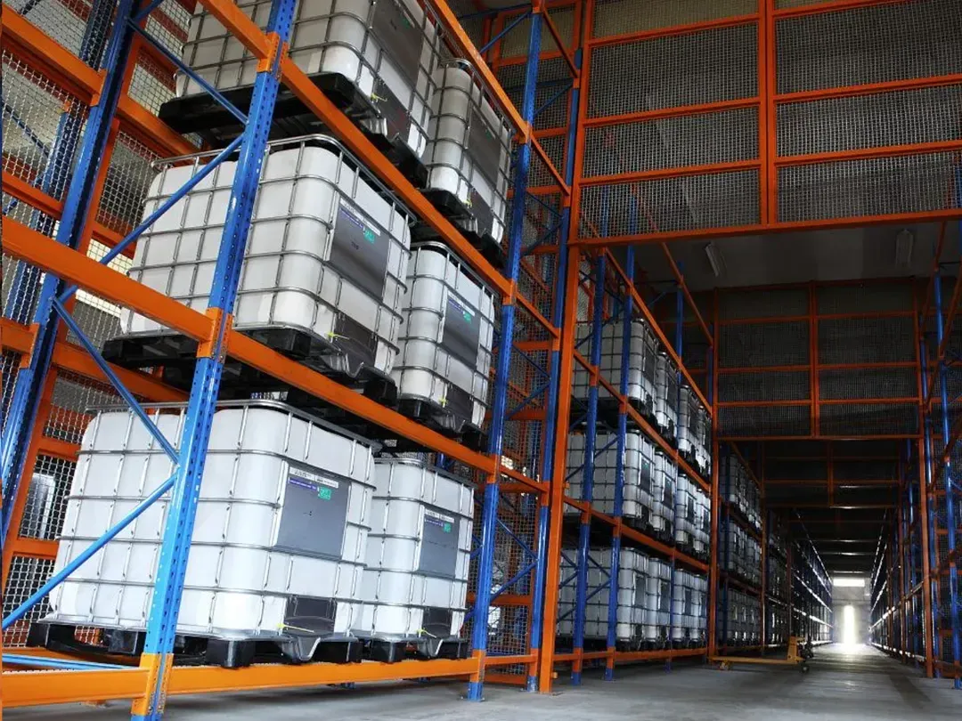 Industrial shelving system with IBC totes and containers